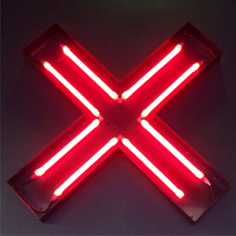 Red neon 'X' | Photo by Tseen Khoo | www.flickr.com/photos/tseenster