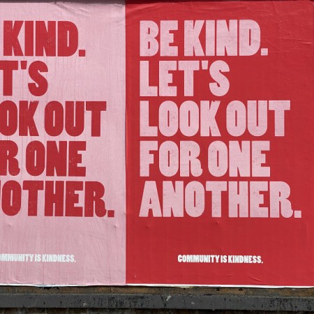 'Be king. Let's look out for one another.' - Poster on a brick wall. Image by John Cameron | unsplash.com