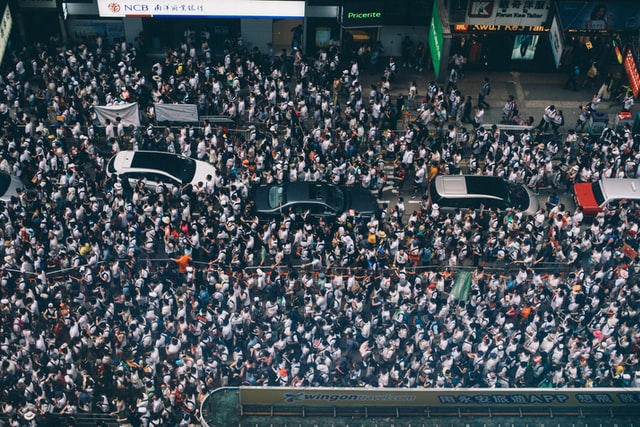 Aerial photograph of people filling a street in protest. A tiny part of the protest when more than 1 million marched against controversial extradition bill in Hong Kong, 09/06/2019.