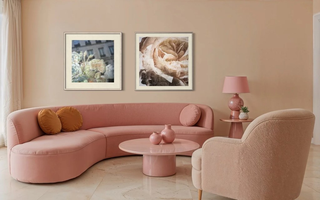 A lounge room with two framed prints on the wall. These are both Bron's photographs. 